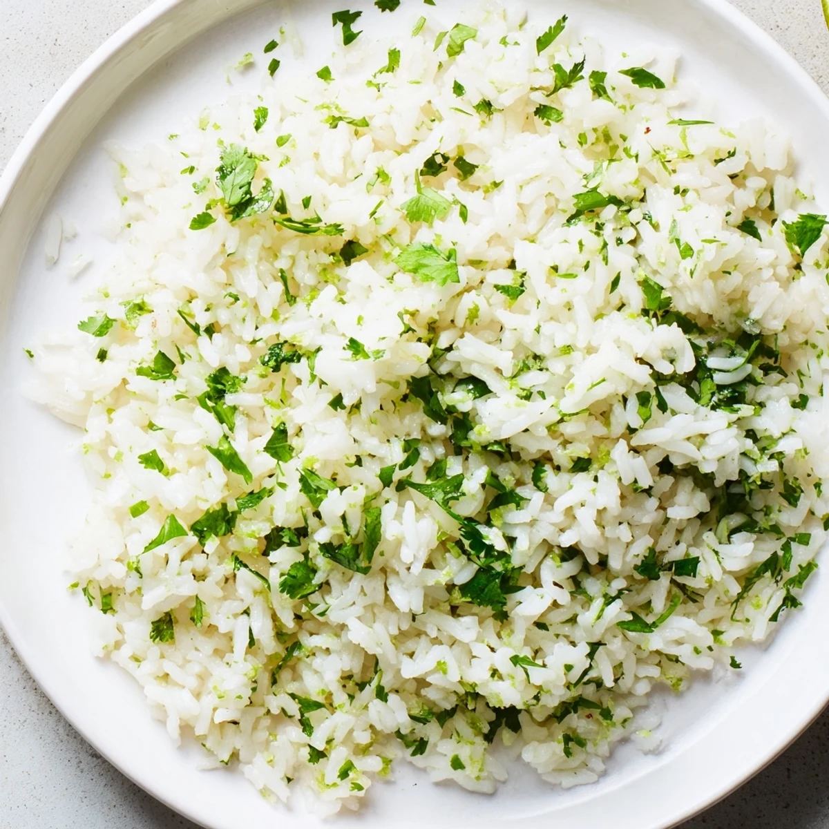 Fluffy cilantro lime rice, infused with citrus and cilantro— a vibrant side dish.