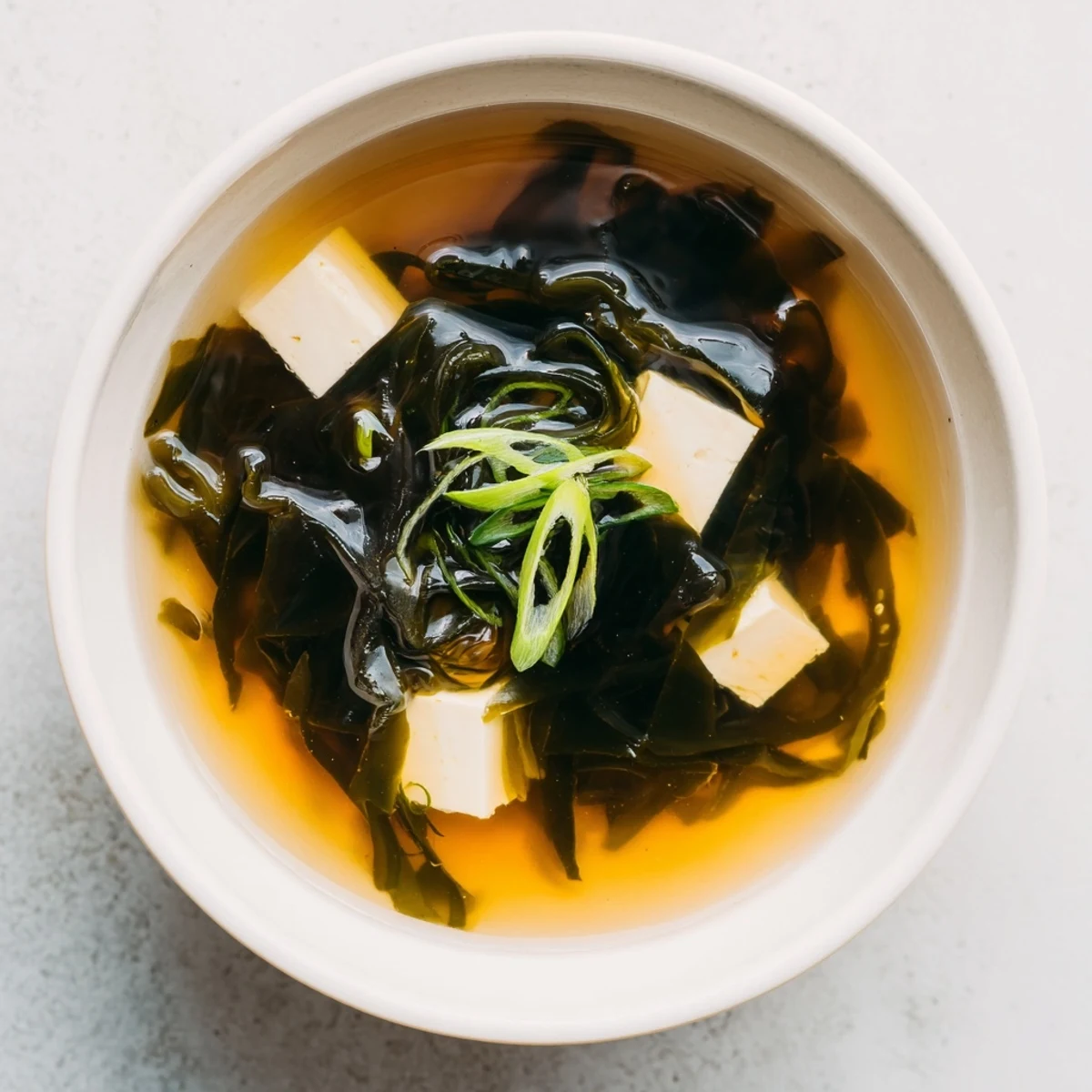 Serving suggestion for Wakame Soup, paired with steamed rice for a light meal.