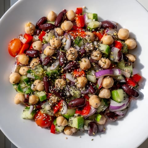 Vibrant Dense Bean Salad, a colorful mix of beans and seeds ready to serve.