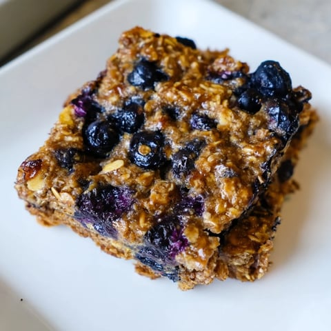 Golden Blueberry Banana Oatmeal Protein Bars: A delicious, chewy breakfast bar with juicy blueberries.