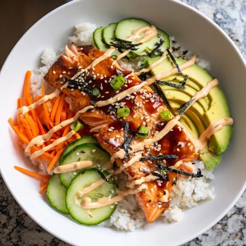A delicious, visually appealing teriyaki salmon rice bowl, ready to enjoy with a satisfying crunch.