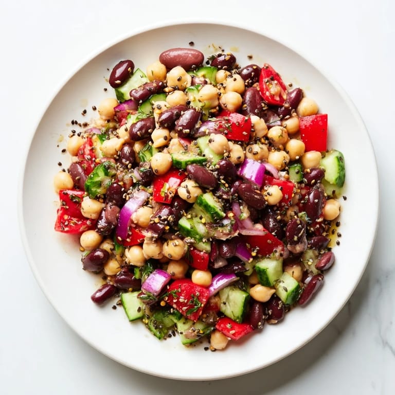 Freshly made Dense Bean Salad with visible seeds, perfect as a healthy lunch.