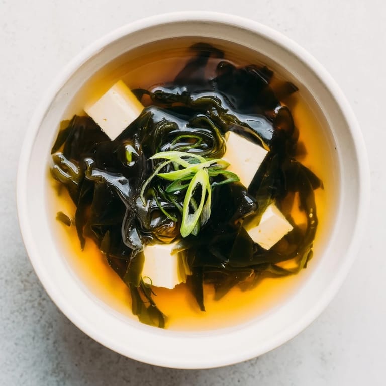 Serving suggestion for Wakame Soup, paired with steamed rice for a light meal.
